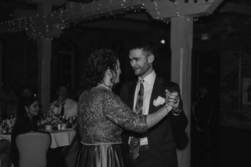 first dance of groom and mother of groom at wedding reception 