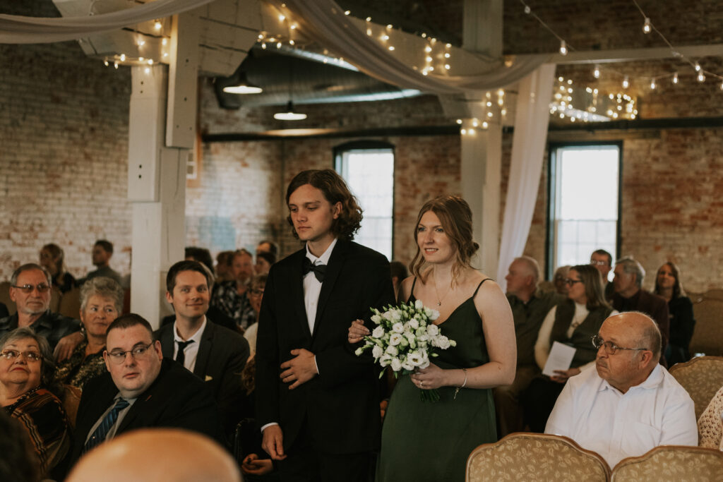 Wedding ceremony processional pictures at Goshen Indiana wedding venue at Bread & Chocolate