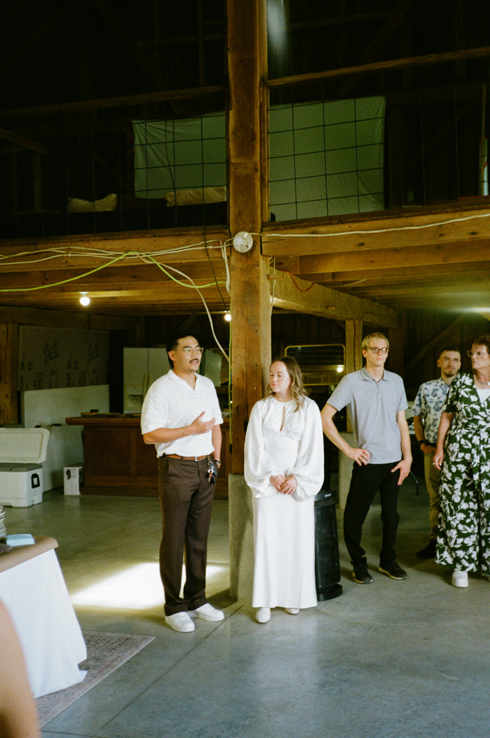 Bride and Groom addressing the guests with a welcome speech and toast during their wedding reception in Warsaw and Winona Lake Indiana.