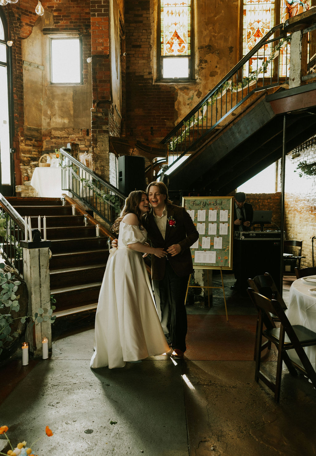 Bride and groom entering the reception at their wedding at the North Church Venue in Muncie, Indiana.