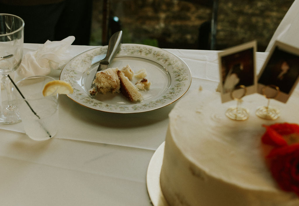 Bride and groom cake cutting at wedding reception in The North Church Wedding Venue in Muncie, Indiana