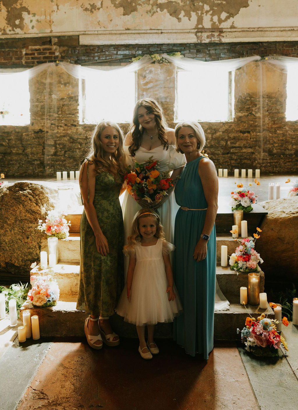 Family portraits with bride and groom at wedding in muncie, indiana at North Church Venue
