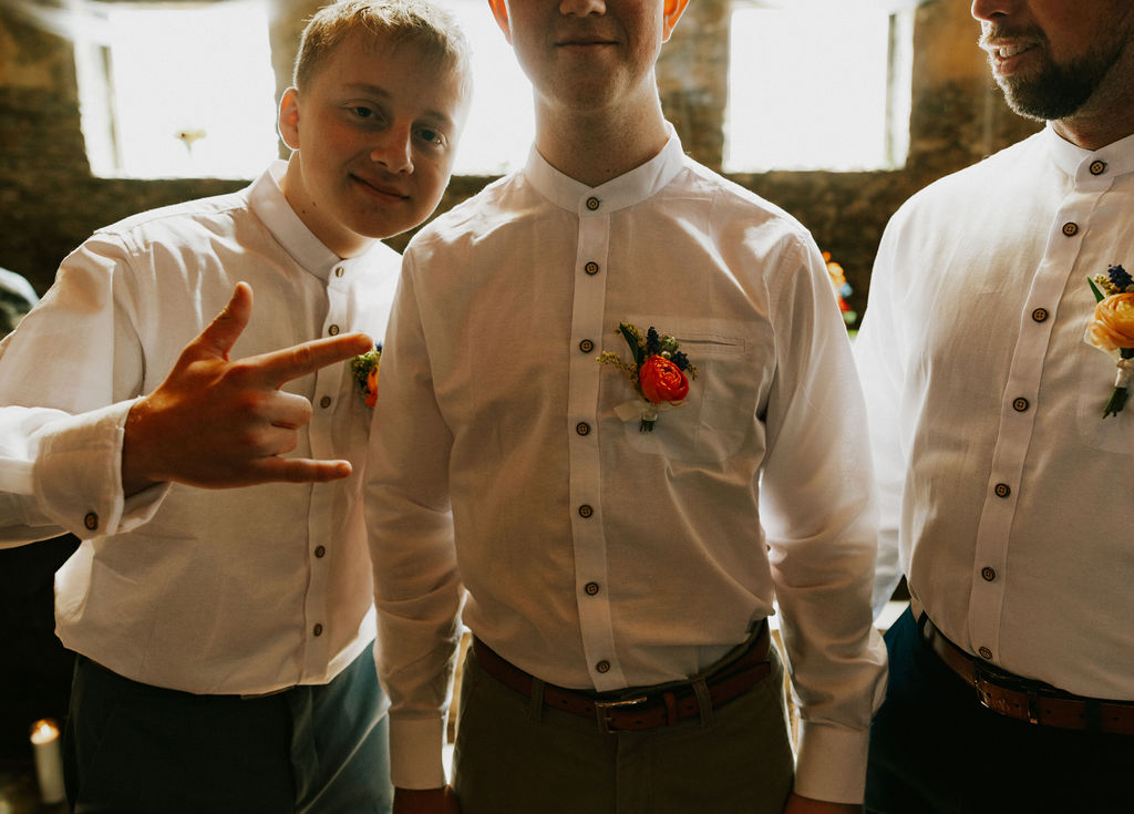 Nontraditional groomsmen portraits with groom at wedding in Muncie, Indiana at the North Church Wedding Venue.