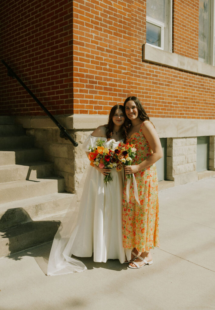 Bridesmaids individual pictures with bride at Muncie, Indiana in the North Church Venue.