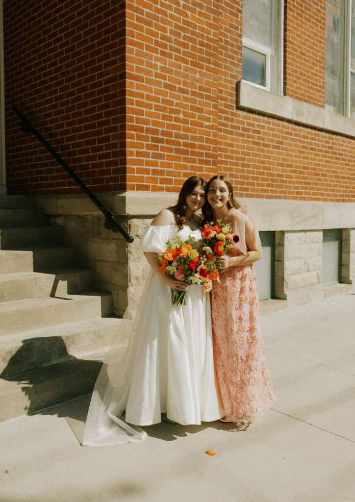 Bridesmaids individual pictures with bride at Muncie, Indiana in the North Church Venue.