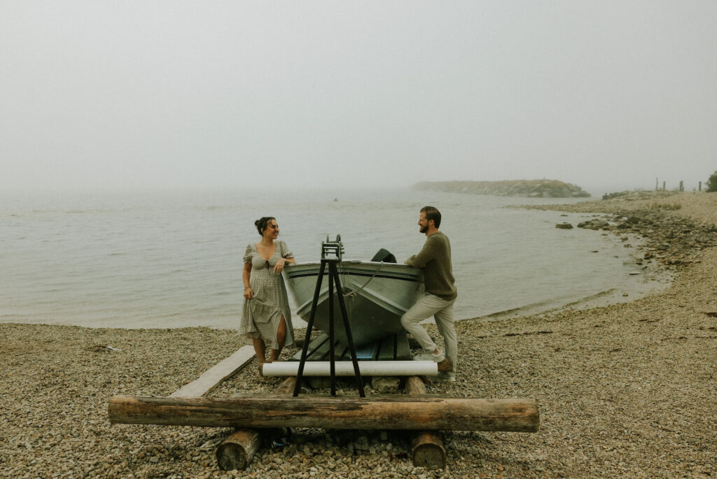 Couple getting engaged on Mackinac Island, Michigan taking couples pictures.