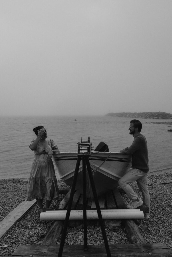 Couple getting engaged on Mackinac Island, Michigan taking couples pictures.