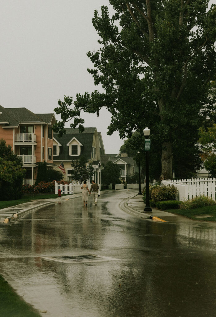 Couple getting engaged on Mackinac Island, Michigan taking couples pictures.