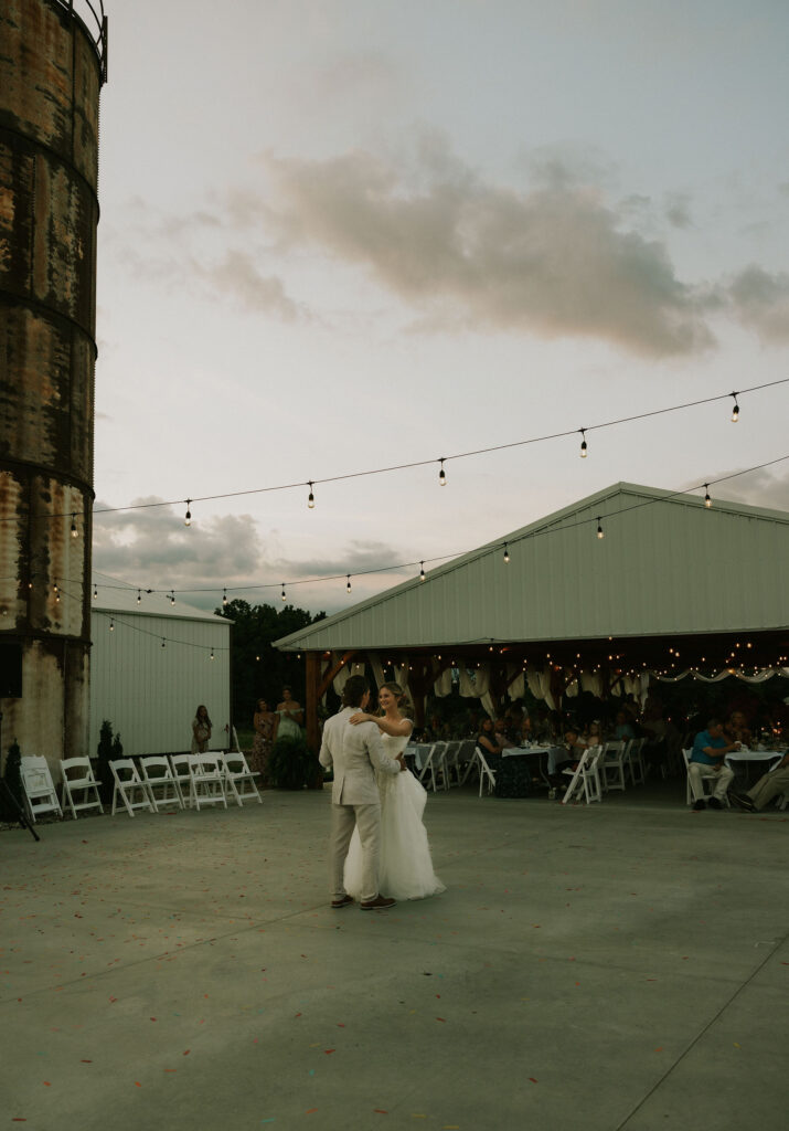 Bride and Groom sharing their first dance together.