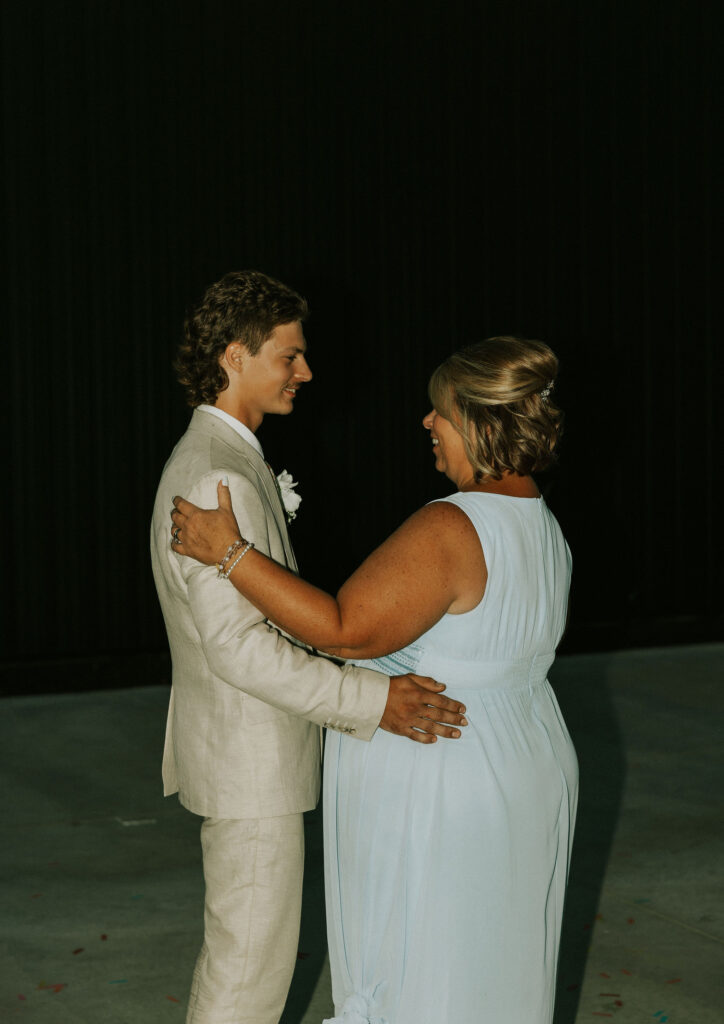 Groom dancing with his mother at the wedding reception.