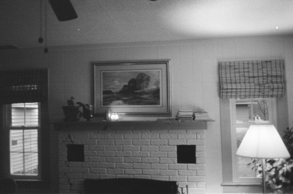 Couple's living room of their home by candlelight.