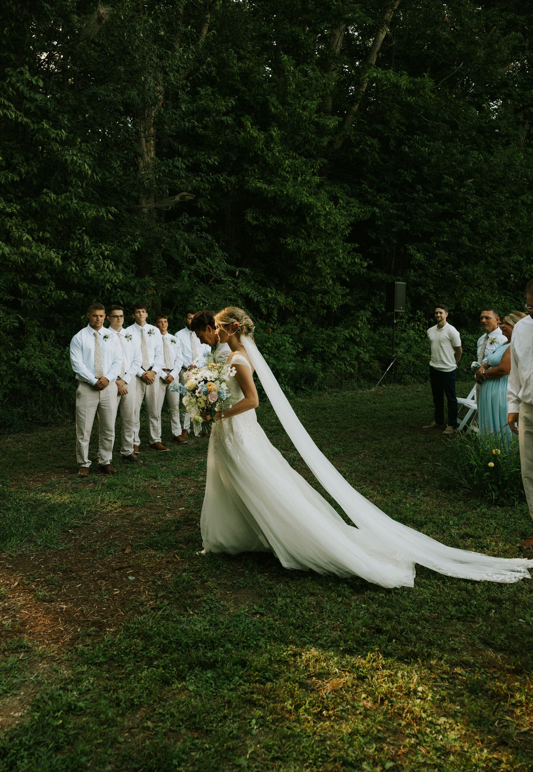 Bride and groom join hands, and walk to the alter. 